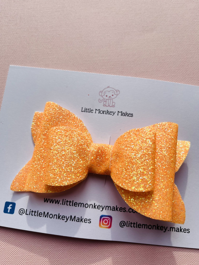 Orange glitter hair bow