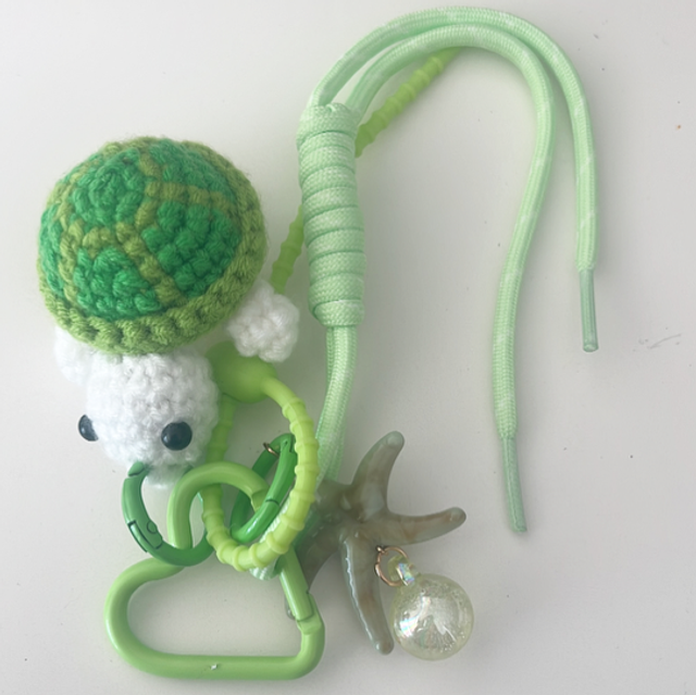 Bijou de sac tortue vert 