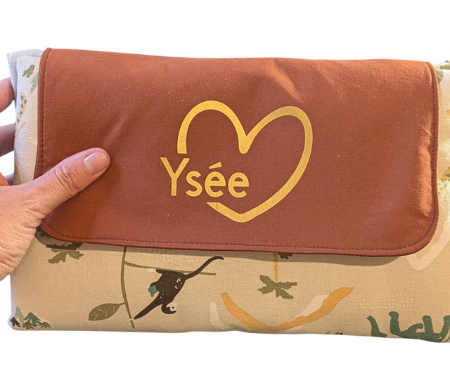 Personnalisation tapis à langer nomade