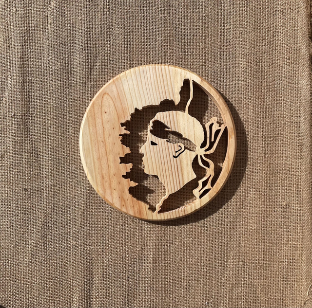 Dessous de plat tête de maure chantournée