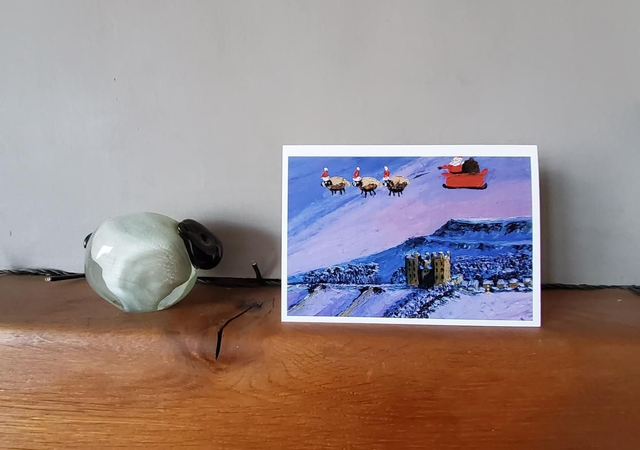 Father Christmas and his flying sheep over Castle Bolton. A6 christmas card.