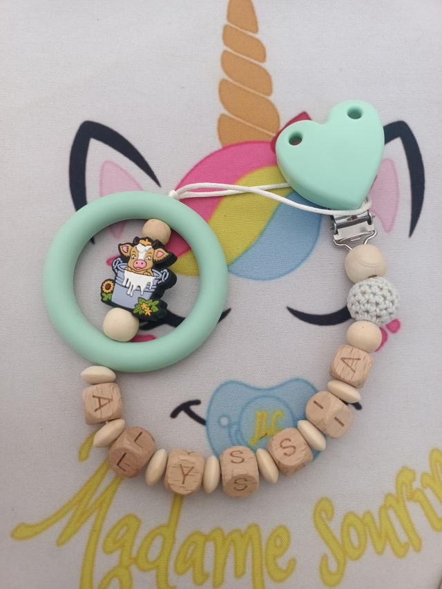 Attache tétine avec anneau Vache