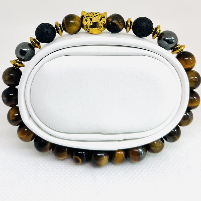 Golden Instinct – Armband met Tijgeroog &amp; Luipaardkop