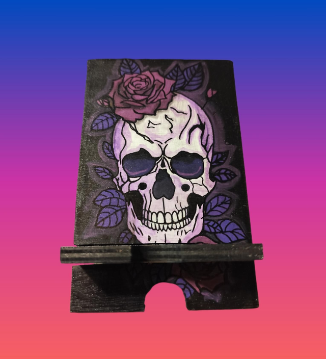 Support de charge téléphone tête de mort