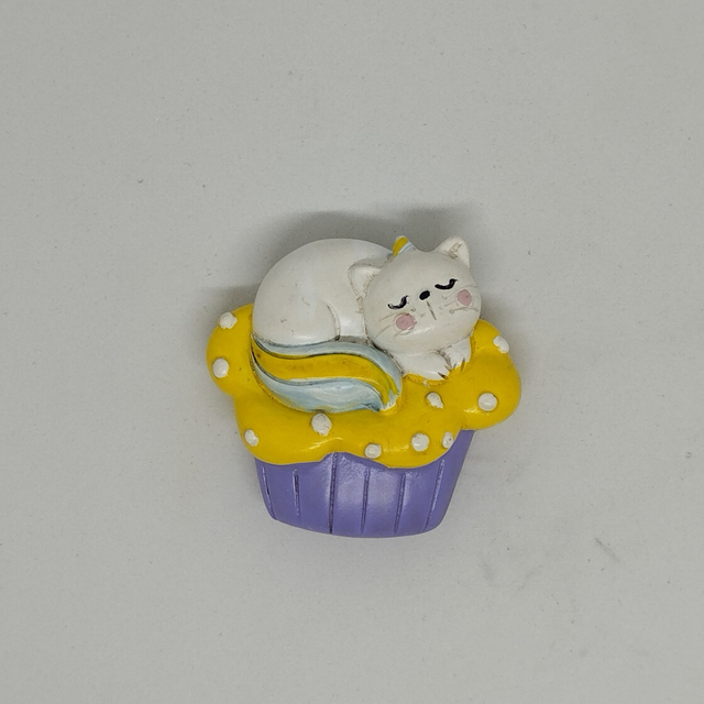 Chat sur cupcake