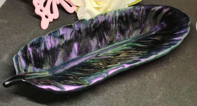 Vide poche plume caméléon violet/vert