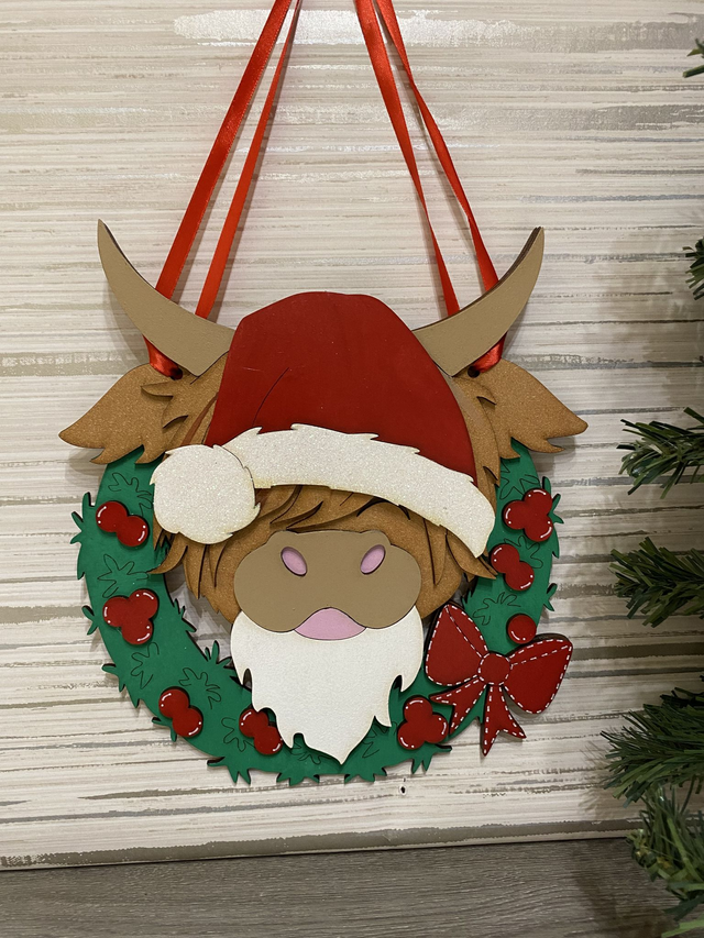 Hanging Highland Cow with Christmas Wreath