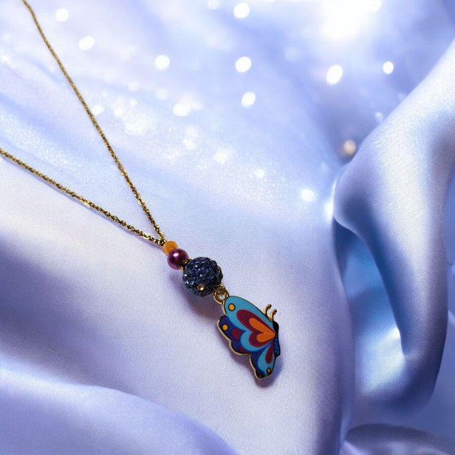 Collier acier inoxydable et cristal bleu papillon
