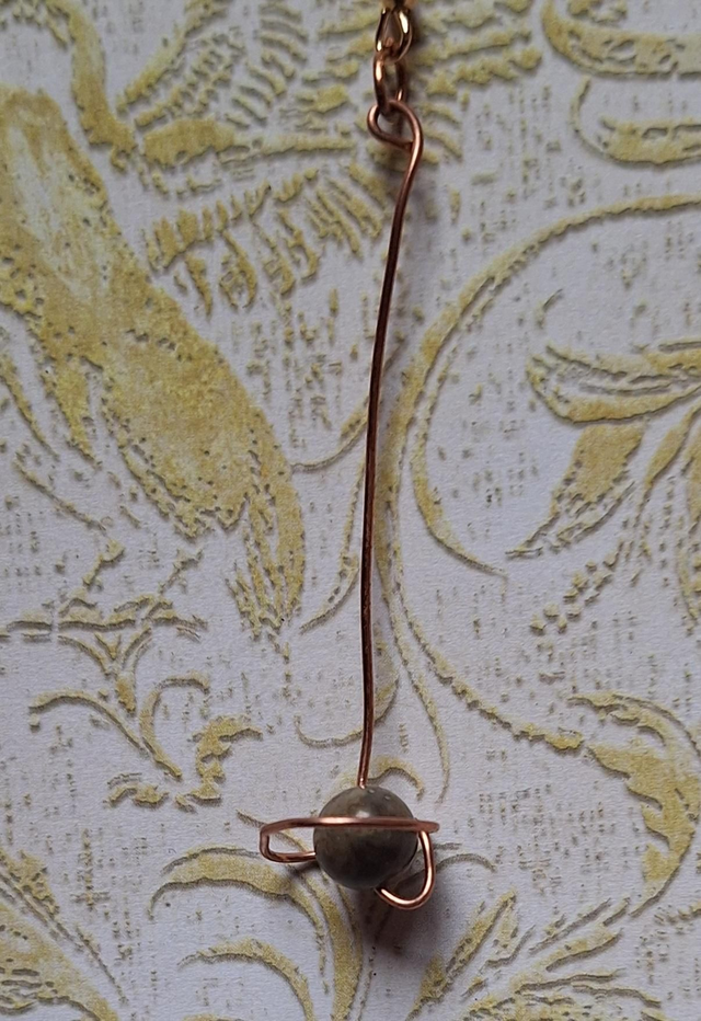 B GRADE saturns love in bronze with ocean agate, single earring