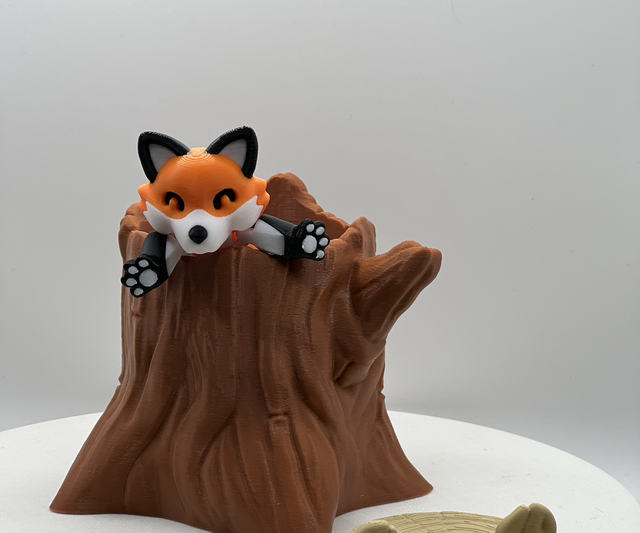 Fox and tree stump