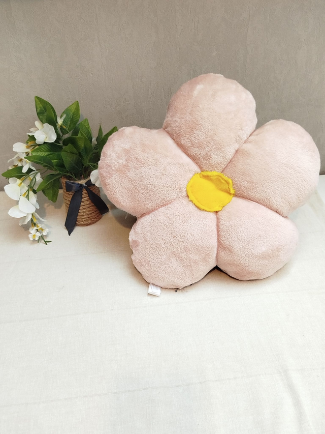 Coussin fleur rose poudré