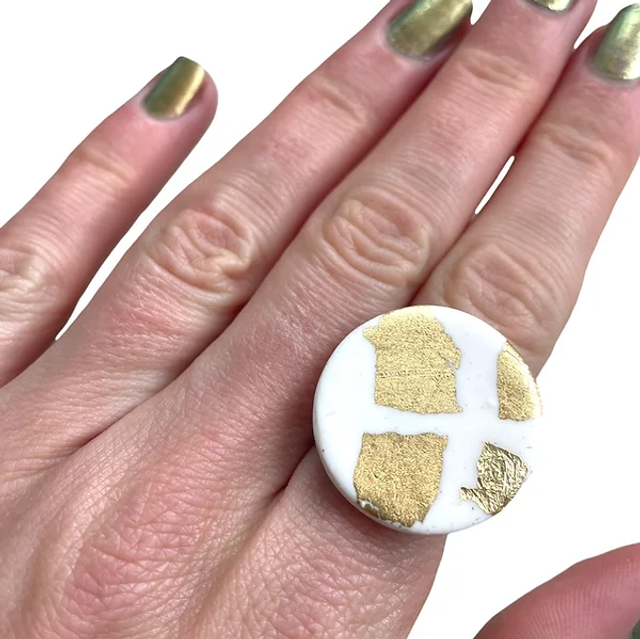 White and gold ring