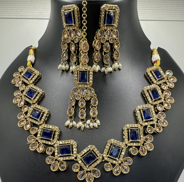 Blue stone necklace with ear rings and tikka 