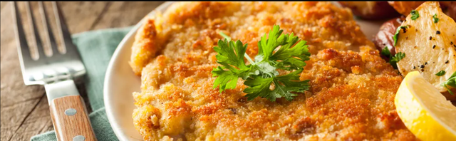 Jeudi:  12.02 Tranche panée de porc ou de poulet 