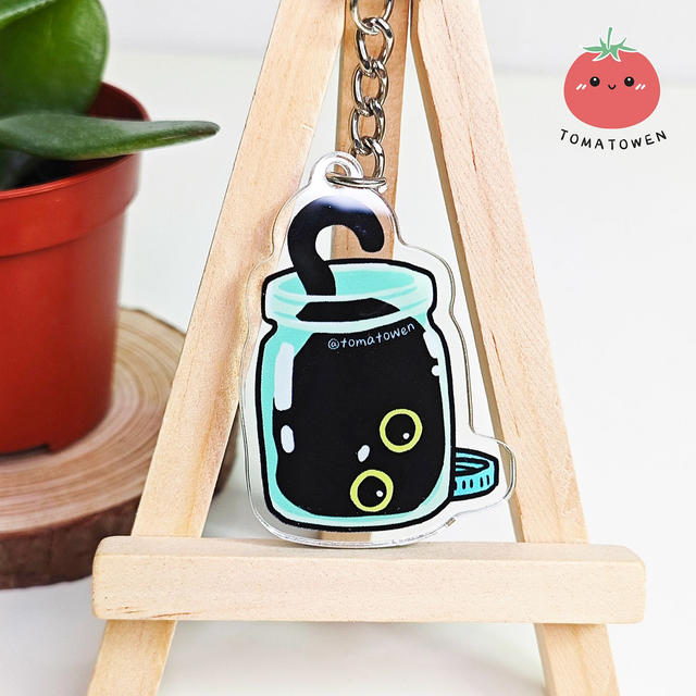 Keychain: Kola black cat in the jar