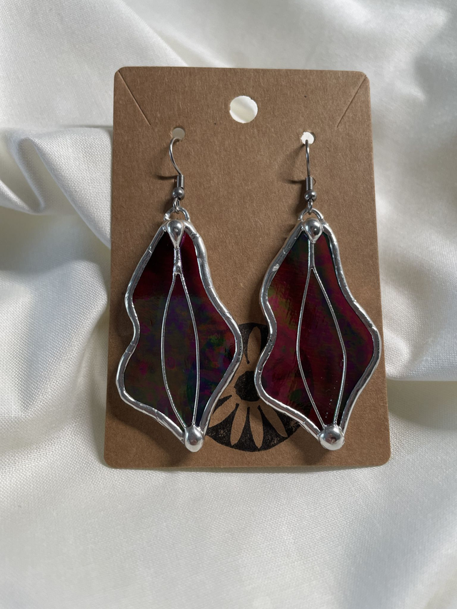 Boucles vulves rouges irisées