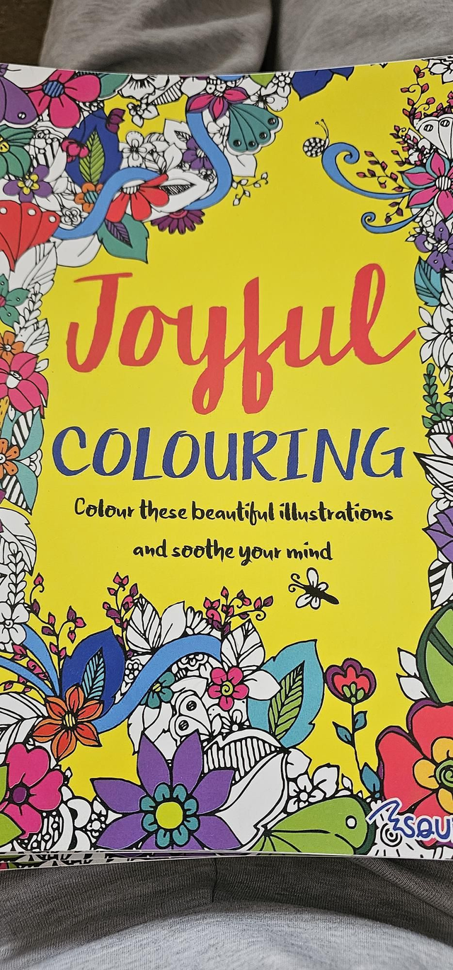 Joyful colouring book with crayons and free bookmark