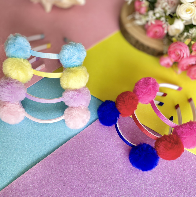 Serre-tête à pompons 