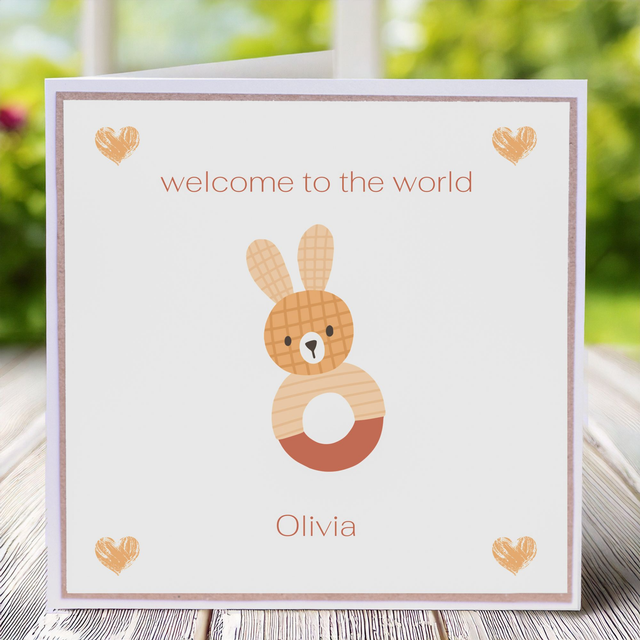 New Baby personalised greetings card with a bunny in soft, neutral tones.