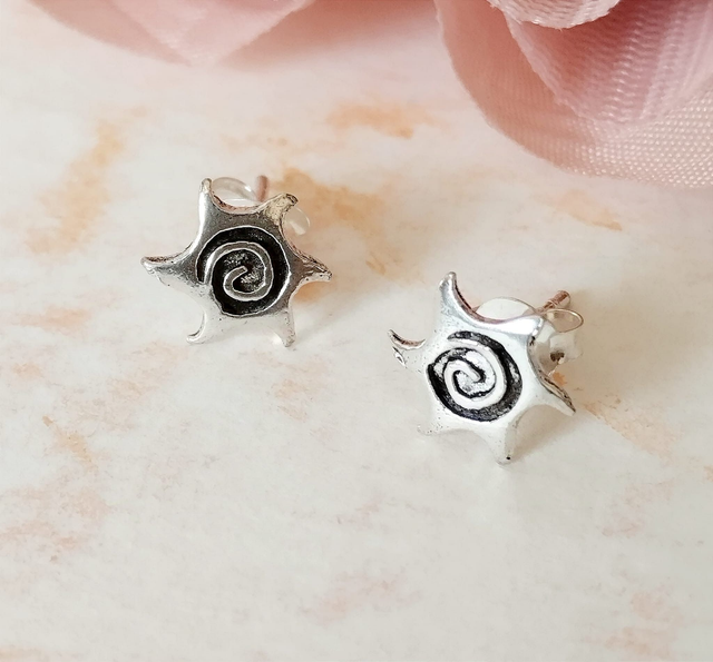 Pendientes presión de estrella espiral. en plata 925