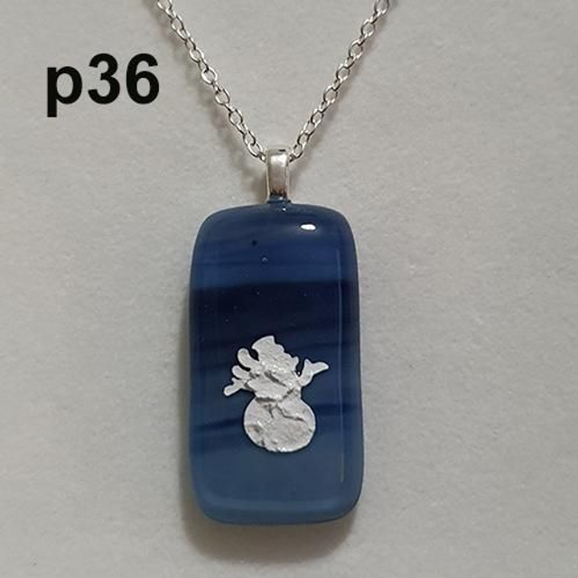 White snowman on whispy blue glass pendant p36
