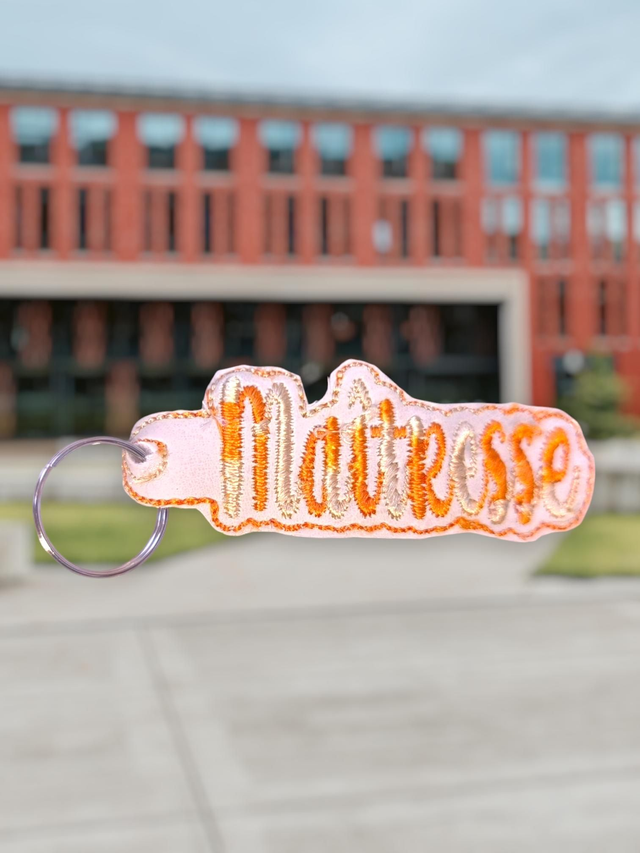 Porte clef maîtresse orange jaune 