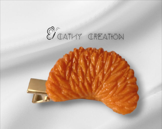Pince à cheveux quartier d' orange 