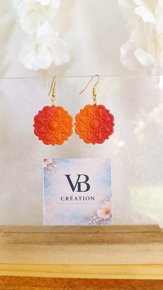 Fleurs dégradées oranges et fushia 