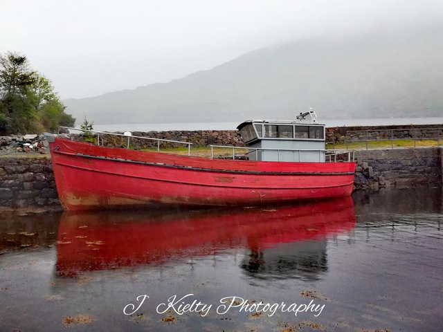 Red Boat at Leenane Pier, County Galway. 