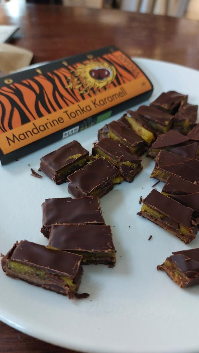 Zotter Tangerine marzipan & tonka bean caramel filled vegan handscooped bar