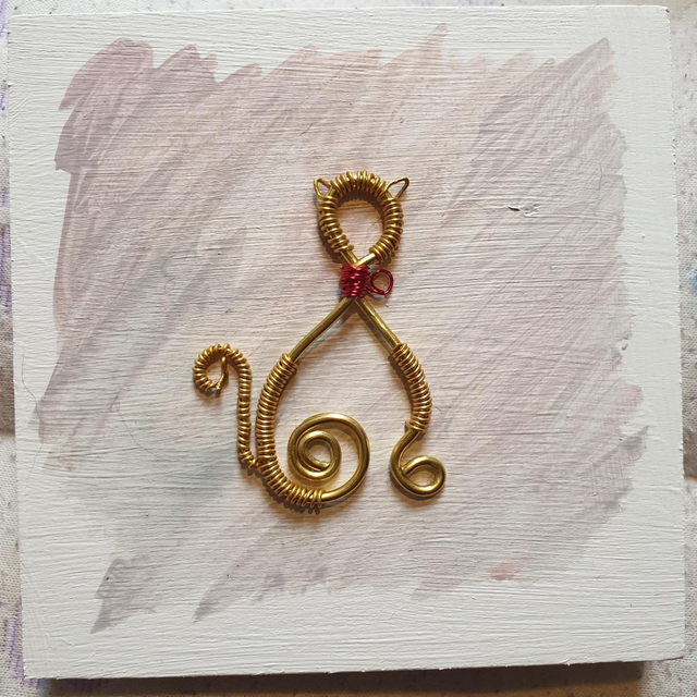 "Tiny Cat" wire sculpture on wooden box canvas 