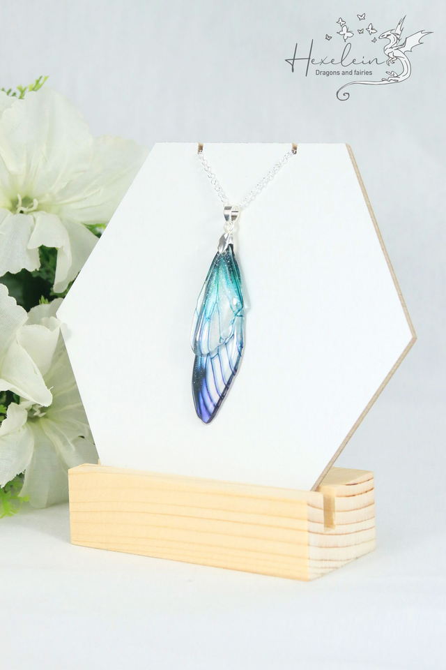 Turquoise blue and purple fairy wings pendant