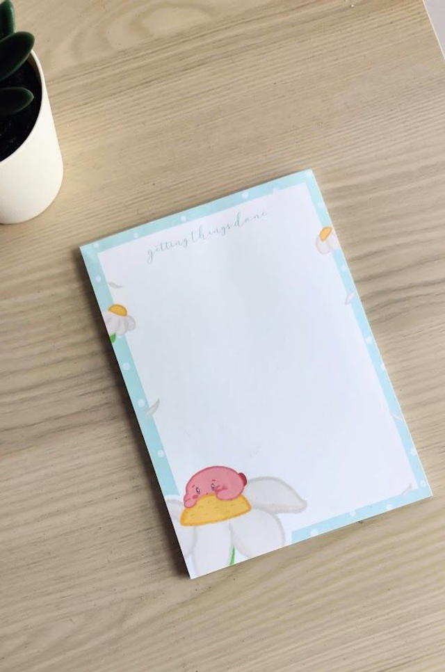 A6 Blue Kirby on a Flower theme Notepad