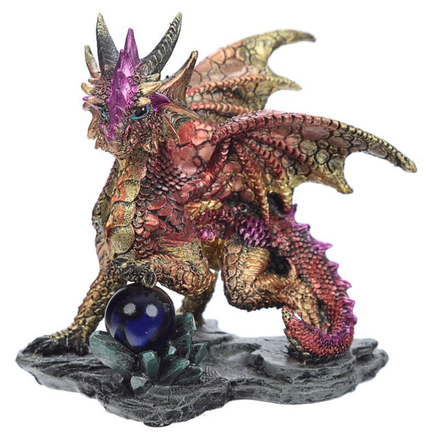 Dragon enchanteur avec boule de cristal rouge