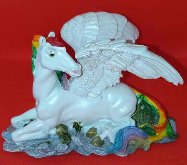 Ceramic Laying Down Rainbow Pegasus Figurine.