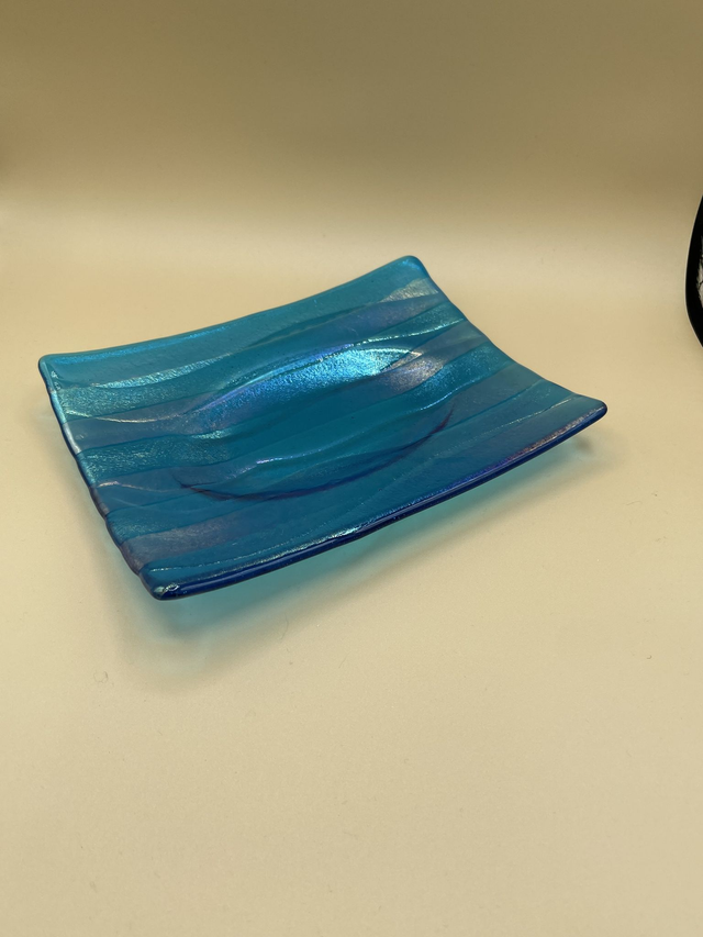Kiln Carved  Dish in Rainbow Iridescent on Transparent Turquoise.