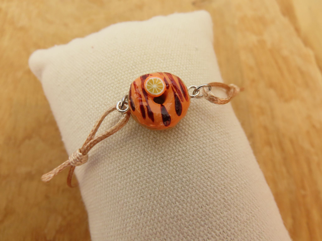 Donut à l'orange et coulis chocolat