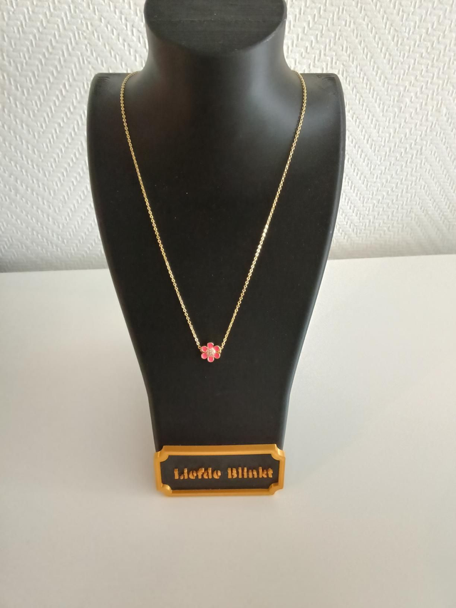 Roze bloemetje goud kleurig