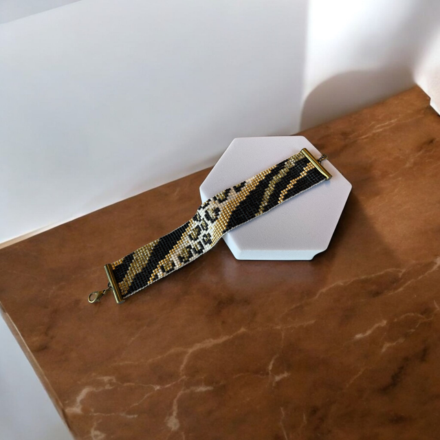 Bracelet large noir et or, tons léopard