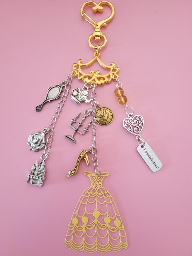 Château Enchanté - Bijou de sac  doré et argenté 