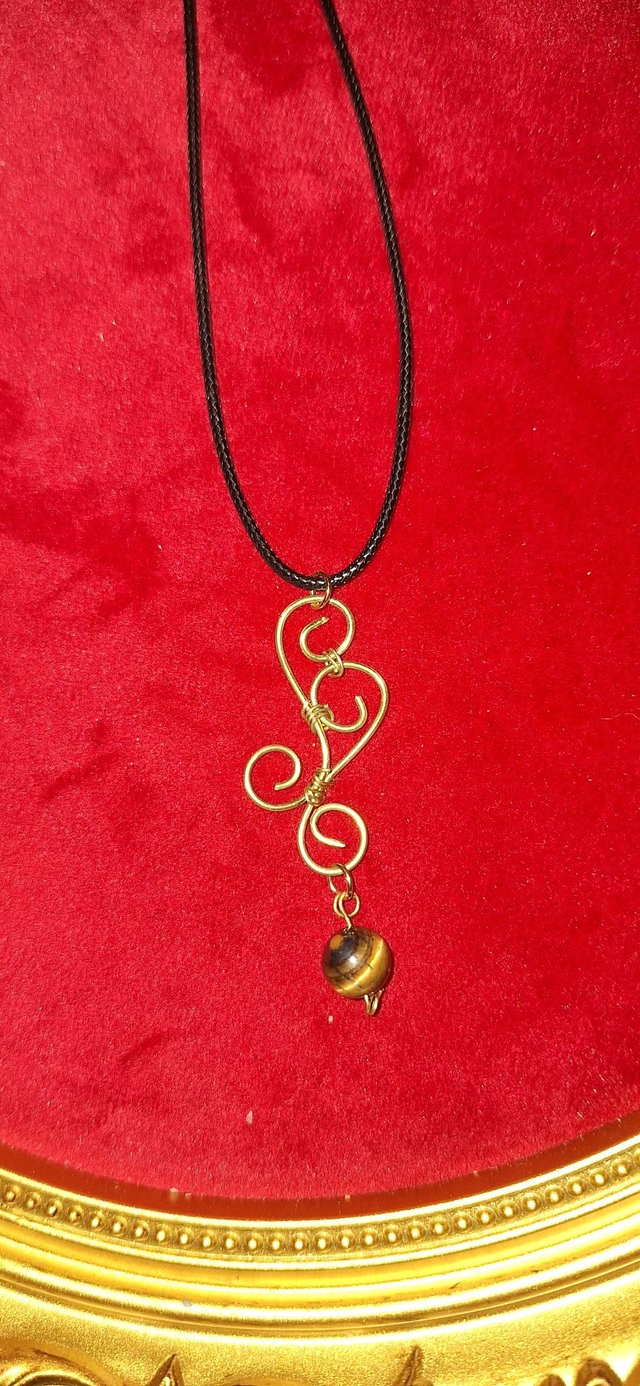 Dream weaver necklace in gold with tigers eye