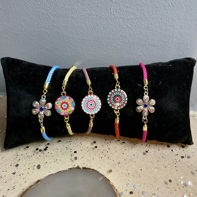 Handmade adjustable cord bracelets.