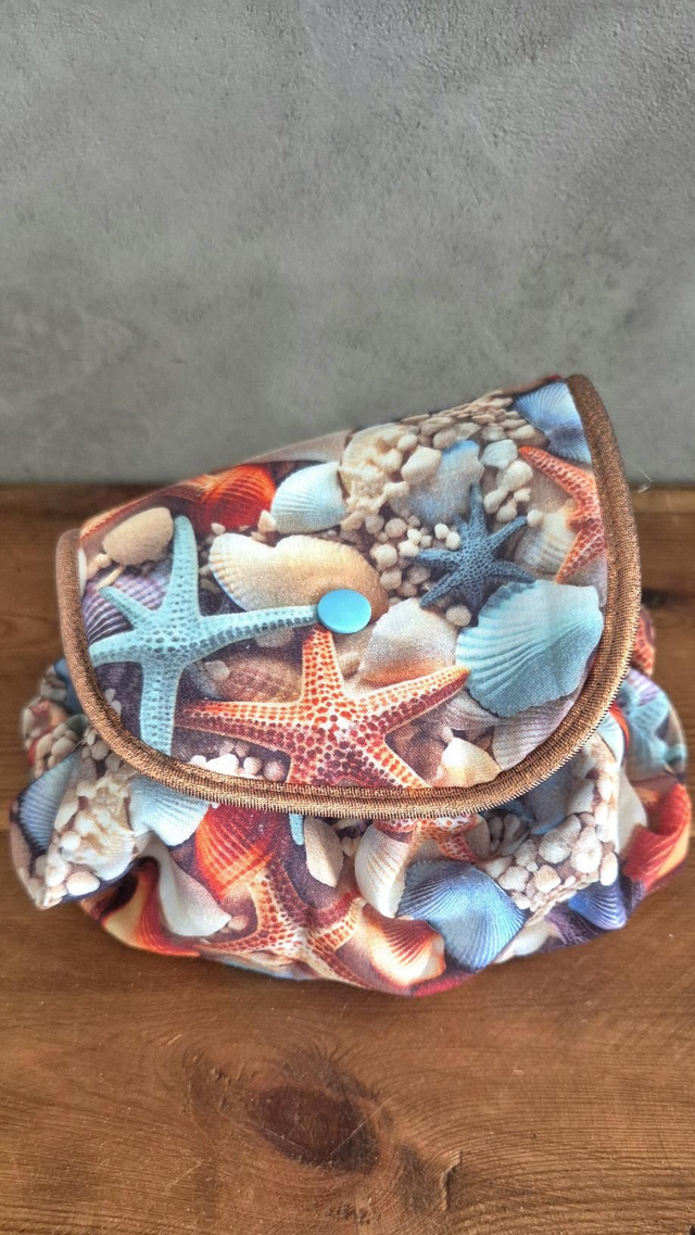 Trousse de maquillage ronde coquillages