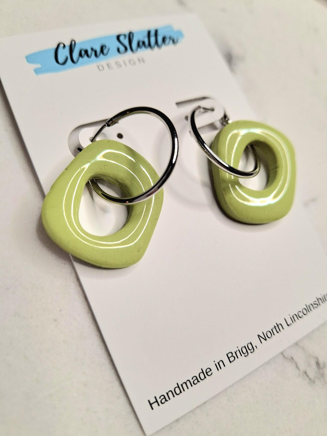 Pistachio green asymmetrical hoop earrings