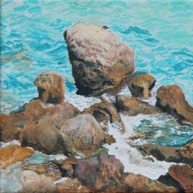 Rocks in turquoise water