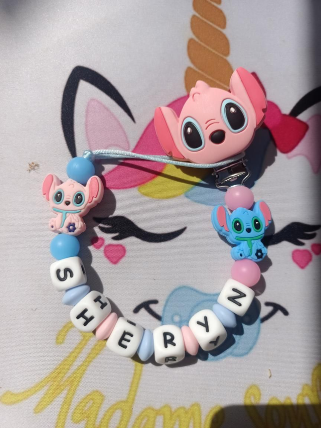 Attache tétine Ang +