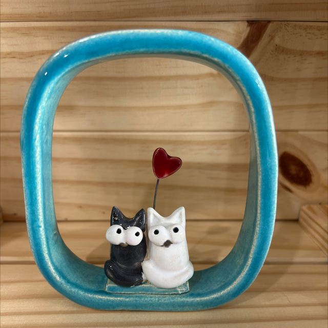 Cornice gatti innamorati azzurra 