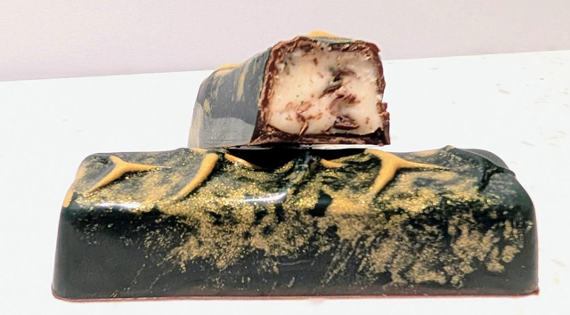 Mint chocolate chip. Dark chocolate shell filled with peppermint fondant and shards of peppermint chocolate 