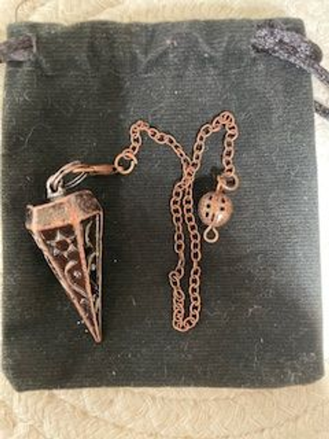 Pendule acier cuivré à facettes