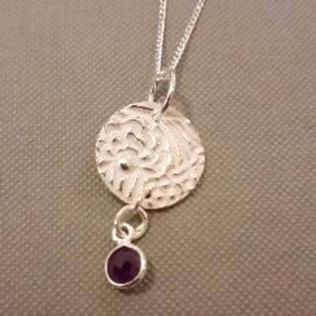 Silver and amethyst pendant